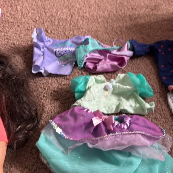 American girl dolls with some clothes and shoes and other items. - Picture 5 of 9